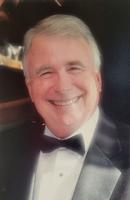John F. Dismukes